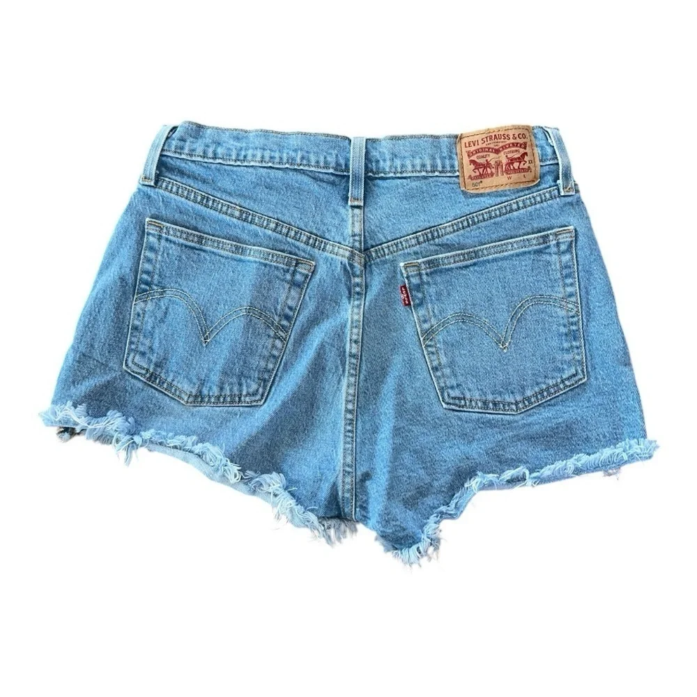 Levi’s 501 Original Fit High Rise Women's blue raw hem Shorts size 29